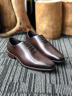 Step into timeless elegance with MSW Handmade Calfskin Leather Shoes. The sharpest dress shoe you'll ever own. Our wholecut oxford has a sleek profile that is guaranteed to turn heads. Crafted from genuine calfskin leather, these shoes blend luxury with comfort. The Fully Grain Leather Insole provide cushioning and support, while the Elegant 5 Eyelet design ensures a secure fit. Choose from a range of classic colors and various sizes to match your style. Meticulously Hand Polished and available Wholecut Oxford, Brown Oxford Shoes, Blazers Shoes, Brown Oxfords, Modern Gentleman, Dress Shoe, Leather Shoes, Calf Skin, Timeless Elegance