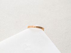 Our simple and dainty Solid Flat Band Ring can be layered with any of our stacking rings. Made with gold filled and sterling silver materials means they can be worn with minimal maintenance. This ring is also available with engraving and personalization, see other listings on our site.• Ring is about 2.5mm tall• Whole ring sizes in 4, 5, 6, 7, 8, 9These have been known to run on the small side, size up if between sizes. *if you are unsure of the ring size we have a printable PDF ring sizer, clic Minimalist Gold Engraved Ring For Everyday, Minimalist Hammered 14k Gold Stackable Rings, Gold Minimalist Stackable Engraved Ring, Minimalist Gold Engraved Stackable Ring, Minimalist Hammered Stackable Rings In Recycled Gold, Adjustable Rose Gold Minimalist Band, Adjustable Minimalist Rose Gold Band, Minimalist Adjustable Engraved Ring For Everyday, Minimalist Engraved Adjustable Ring For Everyday