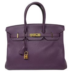 Hermes Crocus Purple Birkin 35 Bag. Gold hardware. Plastic is still on hardware. Good condition. Interior clean. Includes clochette, lock, keys, and dust bag. Guaranteed authentic. Purple Birkin, Hermes Crocodile Bag, Pretty Purses, Horse Motif, Interior Clean, Modernist Jewelry, Togo Leather, Kelly Bag, Vintage Hermes