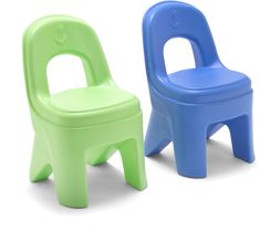 two children's plastic chairs sitting side by side on a white background, one in blue and the other in green