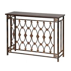 an ornate iron and wood console table