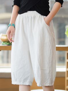 70% linen, 30% cotton
Relaxed fit
2 pockets
Elastic waistband


Measured Size
Waist: 66 cm/26 inchHips: 128 cm/50 inchPants length: 64 cm/25 inchFront crotch: 36 cm/14 inch White Linen Harem Pants For Spring, White Linen Wide-leg Pants, White Relaxed Fit Linen Bottoms, White Linen Shorts With Pockets, Cotton Wide Leg Shorts With Elastic Waistband, White Linen Harem Pants For Summer, Linen Ankle-length Pants With Side Pockets, Wide-leg Linen Shorts With Pockets, Ankle-length Linen Bottoms With Side Pockets