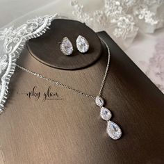 Having a Minimalistic wedding / Garden wedding / Classic wedding or even special occasions? This pretty bridal floral crystal jewelry set is dreamy and classy choice.  Available in silver and rose gold. ♥Lead and nickel free ♥Made from shinny and high-quality zirconia crystal ♥Light weight, comfortable t wear ♥Minimalist style yet elegant ✧JEWELRY DETAILS✧ 【Earrings】 Size approx: 1 cm x 1.3 cm 【Necklace】 Length approx: 40.5 cm + 6 cm extension chain.  M A T E R I A L S Alloy platinum / rose gold Delicate Silver Jewelry Sets For Wedding, Wedding Jewelry Sets With Cubic Zirconia In Drop Shape, Delicate Teardrop Bridal Necklace For Wedding, Sterling Silver Teardrop Bridal Necklace For Wedding, Silver Drop Jewelry Sets For Wedding, Wedding Crystal Jewelry Sets With Teardrop Shape, Elegant Teardrop Crystal Bridal Necklace, Fine Jewelry Bridal Necklace With Hand-set Crystals, Teardrop Cubic Zirconia Bridal Necklace, Fine Jewelry