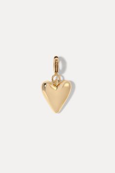 The Heart Charm is the perfect addition to your Hailey Bracelet. Its timeless design adds a touch of love and elegance, making your bracelet even more special. 18k gold-plated brass​ 11mm height, 10mm width Clip Bail​ Pairs with the Hailey Bracelet Build Your Charm Bracelet Here Elegant 14k Gold Heart Charm, Huggie Heart Charm Jewelry For Wedding, Yellow Gold Heart Charm Jewelry For Everyday, Gold Open Heart Charms Jewelry, Gold Open Heart Charm Jewelry, Gold-tone Jewelry With Heart Charm For Everyday, Elegant Heart Charms For Mother's Day, Minimalist Gold Plated Jewelry With Heart Charm, Minimalist Gold-plated Jewelry With Heart Charm