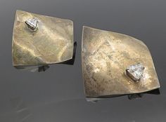 "MEXICO 925 Silver - Vintage Modernist Cubic Zirconia Drop Earrings - EG3958  MEXICO 925 Silver - Vintage Modernist Cubic Zirconia Drop Earrings - EG3958  Jewelry Type:         Earrings   Metal Type:            925 Silver  Metal Size:             1.75\"  Stone Type:            Cubic Zirconia   Condition:              N/A  Jewelry Weight:     21.3 Grams  PLEASE NOTE: THIS ITEM IS PRE-OWNED. ALTHOUGH MOST ITEMS ARE IN VERY GOOD CONDITION, SOME MAY NEED CLEANING AND/OR MINOR REPAIRS. WE MAKE A VERY STRONG EFFORT TO UPLOAD CLEAR PICTURES. PLEASE INSPECT ALL PICTURES AND ASK ALL QUESTIONS YOU MAY HAVE PRIOR TO MAKING A PURCHASE. NOT ALL STONES ARE GENUINE, SOME ARE ENHANCED OR CREATED." White Gold Sterling Silver Clip-on Diamond Earrings, White Gold Clip-on Diamond Earrings In Sterling Silver, Contemporary Silver Diamond Jewelry, Silver Diamond Clip-on Earrings, Silver Clip-on Diamond Earrings, Sterling Silver Clip-on Diamond Earrings, Silver Contemporary Earrings For Anniversary, Silver Sterling Single Cut Diamond Earrings, Silver Single Cut Diamond Sterling Silver Earrings