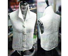 a mannequin is wearing a white sweater and vest with buttons on the collar