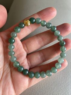 🌈 7.2mm Jadeite Jade Beaded Bracelet, Light Green 🌷 Untreated Natural Jadeite/ Grade A Jade 🌷 Certified : YES 🌷 Jade from Myanmar/ Burma 🌷 Bead size : 7.2mm 🌷 Number of jade bead : 27 🌷 Color :  Light Green 🌷 Free shipping from Hong Kong by with tracking number provided 🌷 Take approximately 7-21 days to arrive worldwide Green Gemstone Stretch Bracelet With Round Beads, Green Stretch Bracelet With Natural Stones, Gemstone Beaded Bracelets For May Birthstone, Hand-strung Jade Stretch Bracelet With Round Beads, Beaded Gemstone Bracelets For May Birthstone, Classic Green Jewelry With 8mm Beads, Green Rondelle Beaded Bracelets With Polished Beads, Elegant Green Stretch Bracelet With Gemstone Beads, Elegant Green Gemstone Bead Stretch Bracelet