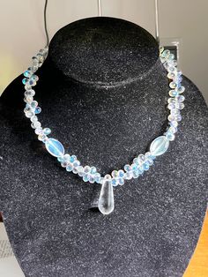 Hello and welcome to my store! Up for sale here is a crystal and glass beaded necklace. The beads are clear with hints of the rainbow in them and the crystals are clear. This necklace is gorgeous and would be a perfect gift for the woman in your life. It measures about 17 inches long and closes with a silver lobster claw clasp. Thanks for looking! Crystal Necklaces With Round Gemstone Beads, Clear Crystal Beaded Necklaces With Faceted Beads, Clear Crystal Necklaces With Faceted Beads For Jewelry Making, Clear Beaded Crystals For Gift, Clear Crystal Beaded Necklaces, Clear Glass Beaded Necklaces With Faceted Beads, Crystal Necklaces With Beaded Chain And Round Beads, Crystal Necklaces With Round Beads For Gifts, Clear Crystal Necklaces With Round Beads For Gifts