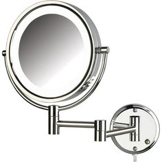 a wall mounted magnifying mirror on a white background