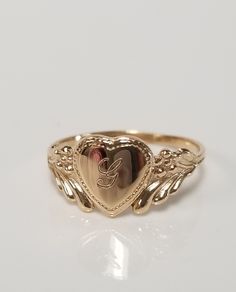 "Thanks for shopping our vintage estate store. We tend to sell well below wholesale and truly hope you enjoy all of our items. Many of the items are one of a kind, so please enjoy scrolling through the pictures and hopefully something will catch your eye. Brown spots are from camera or reflections. Estate 10k yellow gold monogram capital G cursive heart ring. Custom made ring for our shop. Ring size: 3 Setting: 7.5mm 1/4\" to 3/8\" Band width: 1.4mm Weight: .90 gram Marked 10k and it's sweet. On G Initial Ring, Cursive Capital G, G Cursive, Cursive G, J Ring, G Initial, G Ring, Antique Style Rings, Custom Wedding Band