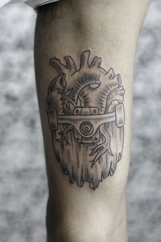 a tattoo on the leg of a person