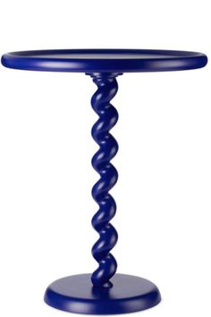 a blue table with spiral legs and a glass top on an isolated white background photo