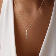 Add dainty to your combinations with our elegant Cross Necklace. Crafted with precision and care, this necklace features a delicate cross pendant adorned with sparkling pave crystals. The elegant design adds a subtle yet stylish accent to any outfit, making it perfect for everyday wear or special occasions. Made from high-quality materials, including durable metal and sparkling crystals, this necklace is designed to last. Its adjustable chain ensures a comfortable fit for everyone, while its tim Dainty Cross Necklace Silver, Simple Pendant Design, Cross Necklace Aesthetic, Dainty Cross Necklace, Diamond Cross Necklace, Silver Cross Necklace, Sterling Silver Cross Necklace, Gold Cross Necklace, Jewelry Accessories Ideas