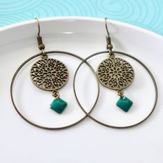 Hoop earrings boho chic bronze rosette and green enamel sequin Lightweight and very pleasant to wear. Ring diameter: 4 cm Green enamel sequin Bronze brass You will love wearing your pretty earrings with your beautiful formal outfit or well dressed to go out, but they will also follow you easily in your hectic daytime life. If you would like another color of enamel do not hesitate to contact me. There is also the matching long necklace: https://uneembellieparis.etsy.com/listing/1173430784 You may Green Metal Hoop Earrings As A Gift, Green Circle Hoop Earrings As Gift, Green Circular Hoop Earrings As A Gift, Green Circular Hoop Earrings For Gifts, Green Circle Hoop Earrings For Gift, Green Bohemian Hoop Earrings Hypoallergenic, Bohemian Green Hoop Jewelry, Green Bohemian Circular Jewelry, Vintage Green Hoop Earrings As Gift