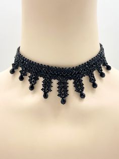 Dear customers, for a price offer of expedited shipping outside of Germany, please contact me directly via Etsy messages. A Gothic Victorian beaded choker with sparkling black crystal drops, made for your dress for gothic carnival or any classy goth look. Goth fashion is distinguished by darkness, mystery, elegant wardrobe pieces and, smoky makeup even though it may surprise some that not all Goths always wear black. It's said that all Goths have the desire to stand out in a society considered t Adjustable Black Crystal Necklaces For Parties, Formal Black Bead Choker Jewelry, Formal Black Beaded Choker Jewelry, Evening Black Bead Choker Necklace, Black Beaded Choker For Evening, Evening Black Beaded Choker Necklace, Formal Black Beaded Choker, Evening Black Beads Choker Necklace, Evening Black Beaded Choker