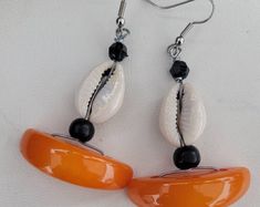 Masai Beaded Earrings - Etsy Beach Earrings With Dangling Beads, Unique Handmade Earrings For Vacation, Adjustable Large Beaded Hoop Earrings As Gift, Handmade Beaded Drop Earrings For Vacation, Bohemian Resin Earrings With Ear Wire, Handmade Casual Hoop Earrings, Trendy Dangling Beads Earrings For Beach, Resin Drop Earrings For Beach, Handmade Casual Hoop Earrings As Gift