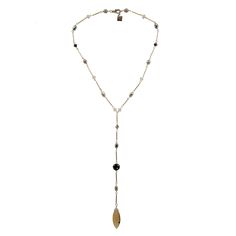 This versatile necklace features an authentic vintage Conta Di Ojo bead from Cape Verde, known for its protective properties and believed to attract good luck and positive energy. Accentuated with Austrian crystals and real pearls, the design adds sophistication and sparkle. Handmade in the U.S. with precision, the necklace is finished with a silver-plated chain for timeless elegance. Perfect for adding cultural significance and style to any outfit, this necklace blends tradition with modern all Adjustable Beaded Teardrop Necklace, Elegant Lariat Beaded Necklaces With Adjustable Chain, Elegant Lariat Beaded Necklace With Adjustable Chain, Elegant Single Strand Adjustable Beaded Necklaces, Elegant Adjustable Single Strand Beaded Necklaces, Adjustable Teardrop Beaded Chain Jewelry, Elegant Adjustable Beaded Necklaces, Elegant Adjustable Beaded Necklace, Elegant Single Strand Long Drop Necklace