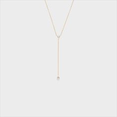 This dainty and sophisticated piece is the perfect addition to any collection! Delicate White Diamond Necklace With Delicate Chain, White Diamond Necklace With Delicate Chain, Classic Adjustable 14k Gold Necklace, Classic Adjustable White Gold Necklace, Delicate White Diamond Necklace With Clavicle Chain, White 14k Gold Diamond Necklace With Clavicle Chain, 14k Gold White Diamond Necklace With Clavicle Chain, White Diamond Necklace With 14k Gold Clavicle Chain, Dainty 14k Gold Long Drop Necklaces