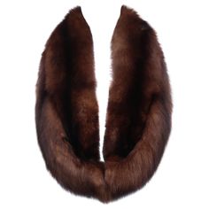 The possibilities are endless with this vintage brown fox fur accessory. It can be worn as a lush collar for coats, tweed jackets or sweaters and do double duty as an elegant 'shoulder warmer' stole for evening attire. A different look can even be created by turning the collar in different directions as shown in photograph 1 and photograph 9. It has two hidden sets of hooks at each end for securing and a velveteen lining. Originally retailed at Ferriss Furs in Pensacola, Florida. Excellent vinta Tweed Jackets, Fur Accessories, Designer Coats, Coat Design, Evening Attire, Fox Fur, Fur Collar, Fur Collars, Tweed Jacket