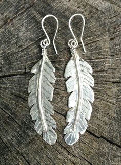 Large Dream Feather Earrings | Etsy Silver Leaf-shaped Handmade Earrings, Silver Engraved Brass Earrings, Engraved Silver Brass Earrings, Handmade Silver Artisan Earrings, Handmade Artisan Silver Earrings, Nickel-free Leaf-shaped Sterling Silver Earrings, Silver Hammered Bohemian Earrings, Unique Hand Forged Sterling Silver Earrings, Bohemian Silver Hammered Earrings