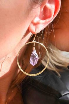 Gorgeous goddess hoops right here. These raw Amethyst crystals are suspended in the center of a hammered hoop and not only look luxurious, but make you feel it too. Wear these and remember you are a goddess.  Amethyst is the stone of your Highest Self, asking you to listen to your intuition as she always knows the truth. ▲ 2" gold plated hammered hoops ▲ Raw Amethyst crystals  ▲ Weight: 1/8 oz  ▲ Handmade in Arizona Love hoop earrings as much as we do?  Shop them all here!  https://etsy.me/3txKb Listen To Your Intuition, Highest Self, Tarnished Jewelry, Raw Amethyst, Handmade Gifts For Her, Amethyst Gold, Hammered Gold, Choker Style, Amethyst Pendant