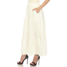 Elevate your fashion game with this flowy and effortlessly chic skirt. This maxi skirt from White Mark boasts a pleated design that adds texture, movement, and a touch of sophistication to your look. Dress it up or down as this skirt is incredibly versatile. Pair it with a tucked in blouse and heels for a sophisticated look or go for a more relaxed vibe with a tucked in tee and sandals and pair it with a jacket on chilly days. It’s perfect for various occasions and style preferences. Maxi Skirt Fall, Chic Skirt, Maxi Skirt Style, Chic Skirts, Tiered Maxi Skirt, Maggy London, Fall Skirts, Skirts Online, White Mark