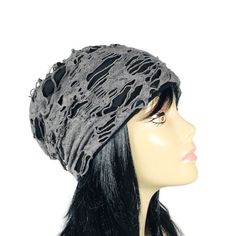 "Grunge Slouchy Beanie Grunge Beanie Gray and Black Grunge Hat Unisex Beanie Goth Slouchy Hat Monster Shreds Beanie Men's Grunge Beanie Grey Grey and black \"shredded\" fabric on one side...fully-lined for maximum comfort on the other. Truly unique unisex grunge slouchy beanie. No raw edges or exposed seams Measure around the head where you want the brim of the hat to fit. Hat will stretch to that circumference. The average woman's head size is 22\" circumference. The average man's head size is Gray Distressed Hat, One Size Fits Most, Gray Crochet Hat, One Size Fits Most, Gray Crochet Hat One Size, Adjustable Casual Beanie Costume Hats, Black Crochet Hat For Festivals, Distressed Black Hat For Summer, Black Distressed Hat For Summer, Black Crochet Hat For Festival, Black Crochet Hat For Festivals (one Size Fits Most)