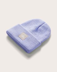 The Beacon is our fun, stylish big fold beanie for your little adventurers! Made from super comfy acrylic with a soft touch, this beanie is perfect for all-day wear. It has a mid-length slouch fit that's great for any outing, and it features a cool woven square label at the front. Plus, this style is available in Adult sizing so you can match with mom or dad! With Mom, Soft Hands, Mid Length, Lavender, Square, How To Wear