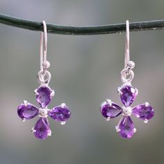 Four petals form a radiant blossom in these pretty earrings from India's Chintan. Amethysts that total 1.5 carats are set in polished sterling silver. .925 Sterling silver Cheap Purple Flower Earrings, Elegant Purple Sterling Silver Flower Earrings, Hypoallergenic Sterling Silver Teardrop Flower Earrings, Hypoallergenic Teardrop Flower Earrings In Sterling Silver, Elegant Purple Teardrop Flower Earrings, Lavender Sterling Silver Earrings With Ear Wire, Elegant Lavender Flower Earrings With Ear Wire, Elegant Lavender Flower Shaped Jewelry, Sterling Silver Gemstone Flower Earrings For Gift