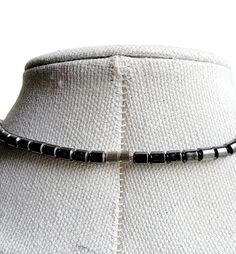 This Hematite Cross Necklace is the perfect accessory to add a touch of sophistication to any look. Crafted from non-magnetic hematite, this necklace is sure to be stylish and timeless. Enjoy the classic look of this necklace every day! Size: about 440mm long, 4mm thick, pendant: 34x23mm Adjustable Hematite Necklace With Black Beads, Silver Beaded Necklace With Black Hematite Beads, Silver Hematite Beaded Necklace With Black Beads, Silver Hematite Jewelry With Black Beads, Silver Hematite Beaded Necklace With Polished Beads, Elegant Hematite Round Bead Necklaces, Elegant Hematite Round Bead Necklace, Elegant Hematite Beaded Necklaces, Minimalist Hematite Round Bead Jewelry