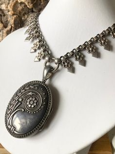 A Stunning antique Victorian collar and locket , Sterling Silver, a wonderful oval locket from the 1880s , untouched original patina with Art Nouveau influences, Hallmarked in Chester 1882 , 59mm high including the bale 33mm wide, some age related wear and an odd ding to the reverse, on a wonderful Victorian collar, 43cm long , the locket can be detached from the collar and the pieces could be worn separately, I have deliberately left the collar and locket in there original condition with no polishing etc Victorian Collar, Oval Locket, Silver Locket, Bear Pendant, Silver Lockets, Cubic Zirconia Rings, Perfect Ring, Antique Victorian, Blue Topaz