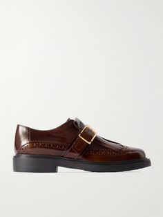 Tod's brogues are detailed with fringing inspired by traditional loafers. Made in Italy from glossed-leather, they have monk-straps accented with gold-tone buckles and embossed 'Pebble' soles. Show yours off with cropped tailoring. Orlebar Brown, Monk Strap Shoes, Flat Dress Shoes, Lipstick Bag, Leather Brogues, Raffia Bag, Floral Shoes, Shoe Boot Sandals, Monk Strap