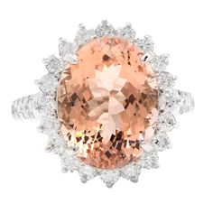 11.10 Carats Exquisite Natural Morganite and Diamond 14K Solid White Gold Ring Suggested Replacement Value: $8,500.00 Total Natural Oval Shaped Morganite Weights: Approx. 10.00 Carats Morganite Measures: Approx. 16.00 x 12.00mm Natural Round Diamonds Weight: 1.10 Carats (color G-H / Clarity SI1-SI2) Ring size: 7 (free re-sizing available) Ring total weight: Approx. 7.5 grams Disclaimer: all weights, measurements and colors are approximate and may vary slightly from the listed dimensions or as se Emerald Cut Aquamarine Ring, Morganite Diamond, Yellow Gold Diamond Ring, Emerald Cut Rings, Etsy Gold Ring, Diamond Cocktail Rings, White Gold Band, White Gold Ring, Gold Diamond Rings