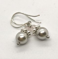 Feminine Pearl Earrings In Silver, Feminine Silver Pearl Earrings, Feminine Silver Pearl Drop Earrings, Silver Feminine Pearl Earrings For Anniversary, Feminine Silver Pearl Earrings For Anniversary, Feminine Silver Earrings For Anniversary, Casually Elegant, Faux Pearl Earrings, Quartz Rose