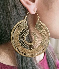 "Mandala Earrings, Ethnic Earrings, Tribal Gold Brass Earrings, Boho Jewelry, Hoop Bohemian Earrings, Gift For Women, Hoop Earrings Handmade Earrings Material:- Brass This gold mandala earrings is lightweight and adjustable to fit any ear! We found this piece while traveling across the tribal deserts in India. Indian tribal jewelry is known for being unique, detailed and high quality. IMPORTANT NOTE....👇 1 product free gift on purchase of 3 products. You can choose the free gift as your wish. T Hoop Earrings Handmade, Mandala Earrings, Oversized Earrings, Gold Mandala, Disc Earrings, Ethnic Earrings, Bohemian Earrings, Handmade Gold, Gold Brass