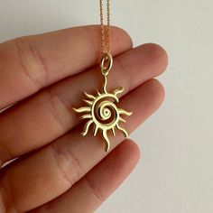 Spiral Sun Necklace, Little Sun Charm, 925 Sterling Silver Minimal Glowing Sun Pendant, Hippie Jewelry, Celestial Necklace, Gift for Her Little Sun Charm is going to brighten your day while completing your outfit ☀️ Product Details, - Carefully produced with High Quality 925k Sterling Silver - 14k Gold Plated - Height of the pendant: 2.2 cm (0.83 inches) - Chain Length is optional; 45 cm or 55 cm, and also you can order the pendant with no chain - Unique and delicate design ✈️✈️✈️ EXPRESS & FREE SHIPPING ✈️✈️✈️ - All items come in nicely packaged beautiful jewelry boxes ready to gift - All of our jewelry are hypoallergenic. For long term use, it should be protected from chemical products such as detergents, bleach, perfume. BEST GIFT FOR THE LOVELY ONES ♥️ Feel free to contact us for any q Sun Themed Accessories, Evil Eye Gifts, Sun Necklace Silver, Sun Necklaces, Sun Choker, Sun Accessories, Spiral Sun, Sun Jewelry, Necklace Sun