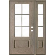 a double door with glass panels and sidelights