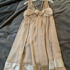 Beautiful Grayish With Purple Sheen Vera Wang Dress. Comes To Just Below Knee. Worn Once. Beautiful Strapped Details With Bow Front. Back Zipper. Sheer Top Layer With Silky Attached Slip Underneath. 100% Silk. Vera Wang Dresses, Wang Dress, Vera Wang Dress, Sheer Top, Vera Wang, White Skirts, Silk Dress, Gray Color, Size 12