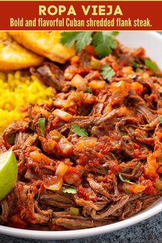 an image of a plate of food with meat and vegetables on it that says ropa vieja bold and flavorful shredded flank steak steak steak