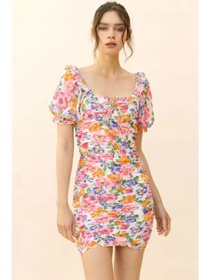 This pretty style features a ruffled square neckline, short sleeves with ruffled ends, and a fitted bodycon silhouette. It also has an upper open back detail and a smocked back center. Fitted Puff Sleeve Dress With Floral Print For Brunch, Brunch Floral Print Fitted Puff Sleeve Dress, Fitted Floral Print Puff Sleeve Dress For Brunch, Puff Sleeve Dress With Floral Print And Fitted Bodice, Floral Print Puff Sleeve Dress With Fitted Bodice, Summer Fitted Mini Dress With Puff Sleeves, Fitted Summer Mini Dress With Puff Sleeves, Fitted Puff Sleeve Mini Dress For Summer, Fitted Mini Dress With Puff Sleeves For Summer