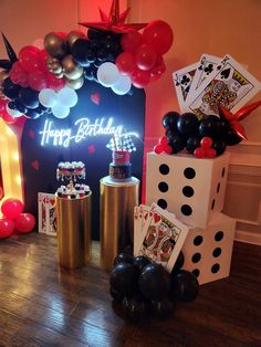 a casino themed birthday party with dices and balloons