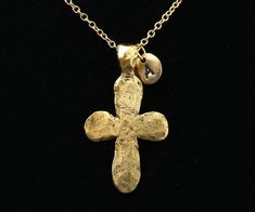 "This Ancient Gold Cross Necklace is made of high-quality components - the American-made strong gold-plated steel chain and the beautiful, expensive-looking gold-plated cross pendant, finished with a larger lobster clasp for your convenience. It will be a pleasure to wear and see. You can easily customize this necklace by choosing different chain lengths and an initial charm letter - choose it from the drop-down menu when you add items to the cart The available chain length - 14\", 16\", 18\", 20\", 22\", 24\" The main pendant size: 48 mm tall, 27 mm wide The initial letter charm size: 10 mm (please see the second photo for scale) +  EXTRA INITIAL CHARMS: https://www.etsy.com/listing/1188728114 + DANGLING BIRTHSTONES: https://www.etsy.com/listing/690860375  You will receive your necklace c Gold-tone Cross Jewelry With Adjustable Chain, Gold Plated Pendant Cross Necklace, Gold Plated Cross Pendant Necklace, Gold Cross Jewelry With Adjustable Chain, Brass Cross Necklace As A Gift, Yellow Gold Brass Cross Pendant Necklace, Brass Cross Necklace For Gift, Yellow Gold Brass Necklace With Cross Pendant, Gold Cross-shaped Metal Jewelry