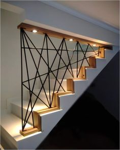 a stair case with some lights on it