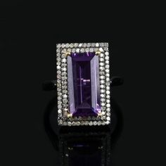 ⚫ This Ring Made With Amethyst & Diamonds in 925 Sterling Silver,⚫ Pave Diamond Gemstone Cocktail Ring 925 Sterling Silver Jewelry.⚫ Gemstone Ring, Diamond Jewelry, Everyday Jewelry⚫ Special customize for Mother's day, Anniversary, Birthday Gift, Valentine, Christmas. Item Details:Gross Weight:6.31 Grams925 Sterling Silver Weight:5.15 GramsDiamond Weight:0.91 CaratsAmethyst Weight:4.90 CaratsItem Size: 21x15 MMRing Size: US 7Item SKU: AROS-1392Gemstone color may vary due to natural and avail Luxury Purple Amethyst Ring, Rectangular Shape, Luxury Purple Amethyst Rectangular Ring, Luxury Purple Rectangular Amethyst Ring, Luxury Purple Gemstones With Halo Setting, Luxury Rectangular Amethyst Ring, Luxury Rectangular Amethyst Ring As A Gift, Luxury Rectangular Amethyst Ring For Gift, Luxury Rectangular Amethyst Ring Gift, Luxury Purple Baguette Cut Jewelry