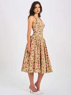 Behold our Niya maxi dress, a stunning union of style and ease. Delicately crafted from a charming floral print fabric, it exudes feminine allure with every step. The drop waist design imparts a contemporary silhouette, while padded cups ensure a flattering fit. Practicality meets elegance with convenient pockets discreetly integrated into the design. Structured with built-in bones and hard mesh supporting the hemline, it promises both form and function. Seamlessly finished with an invisible zip Halter Corset, Corset Maxi Dress, Satin Corset Dress, High Waist Long Skirt, Long Skirt Outfits, Plain Dress, Bodycon Floral Dress, Floral Print Fabric, Satin Gown