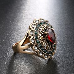 Step up your accessory collection with this goldtone ring that features sparkling cubic zirconia accents for elegant flair. Face: 0.94'' diameter Goldtone copper / crystal / cubic zirconia Copper Crystal, Wedding Accessories Jewelry, Cooking Gadgets, Red Crystals, Accessories Jewelry, Step Up, Wedding Accessories, Class Ring, Pear