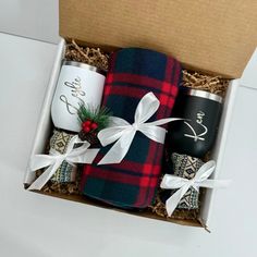 two wrapped gifts in a gift box