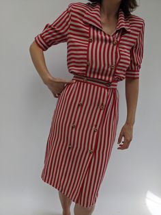 Stunning silk striped shirtdress from long time designer, Albert Nipon. The dress has a unique cut for a petite frame. The dress has gold toned double breasted buttons down the front, a collared neckline and short sleeves. Sweet snaps at the waistline add reinforcement. Tag reads Albert Nippon Natalie Borton, Knit Outerwear, Striped Shirt Dress, Line Shopping, Shirtdress, Dress Suits, Shop Swimwear, Raw Silk, Toddler Dress