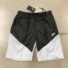 NWT Nike CT5617-010 Men Sportswear Windrunner Shorts Polyamide Black Grey Size S Details: 100% Authentic Style number: CT5617-010 Material: 100% Polyamide Color: Black grey Size: Small The breathable mesh lining An elastic waistband with drawstring offers an adjustable fit Open hand pockets Back zip pocket About 8" inseam Standard fit at knee length Please consider the size chart on picture #8 and #9 as a reference  Size approximately: waist 14" one side, 20.5" shorts length Retail: $55 + tax Ab Holiday Finds, Men Sportswear, Open Hands, Active Wear Shorts, Basketball Shorts, Mens Sportswear, Grey Shorts, Black Grey, Short Pants