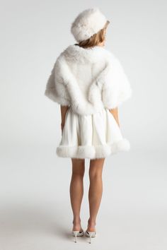 Cropped fur coats are our muse this season. Made of high-quality, environementally-friendly fur fabric, this chic coat is a perfect addition to your wardrobe. Its cropped design adds playfulness while the plush material adds warmth. Faux eco-friendly fur Cropped design Buckle included Dry clean only Fur Coat White, White Fur Coat, Coat White, Chic Coat, Fur Fabric, Fur Fabrics, Fur Coats, Muse, Fur Coat